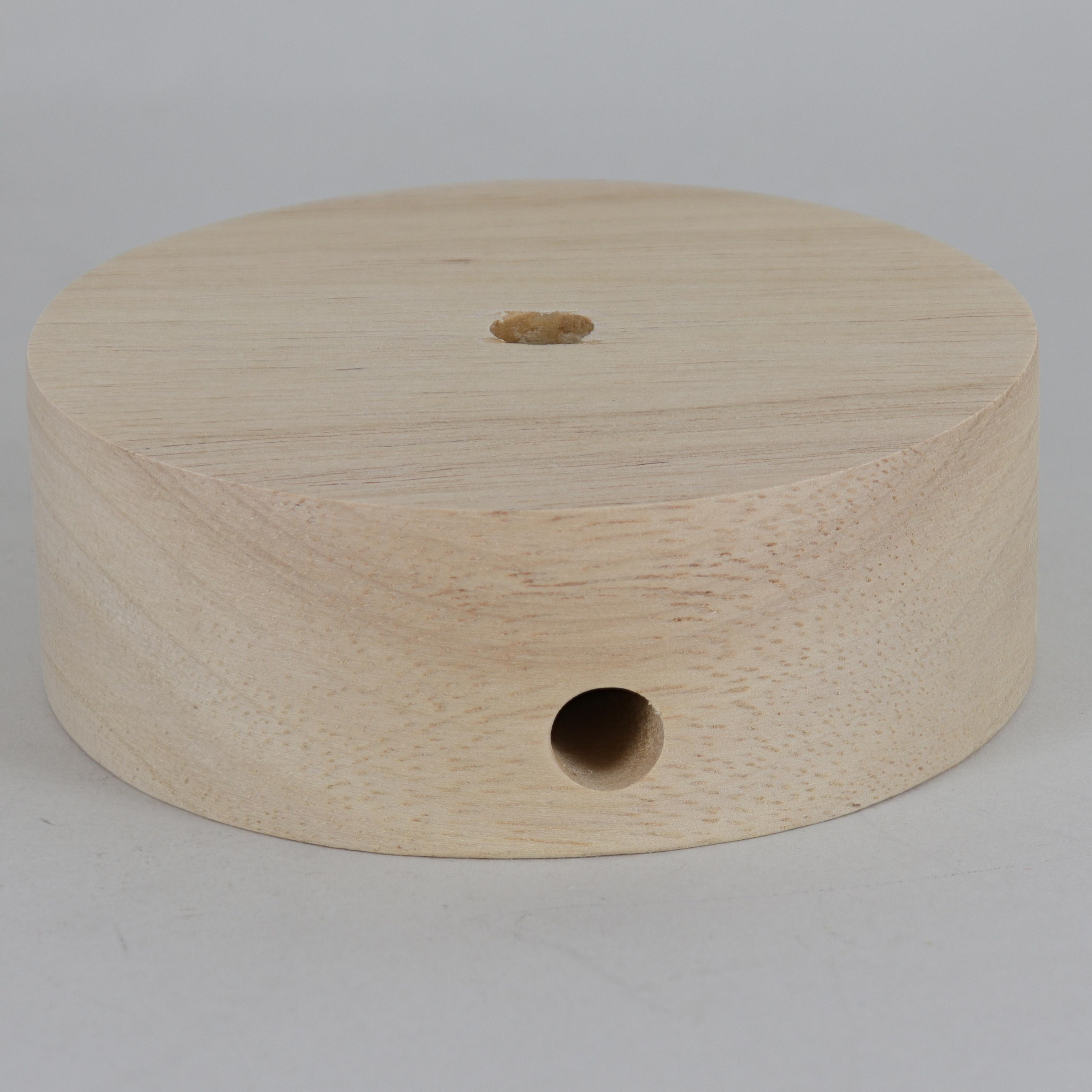 4in Diameter Plain Straight Edge Unfinished Wood Base with Recessed Bottom Hole and Wire Exit. Questions & Answers